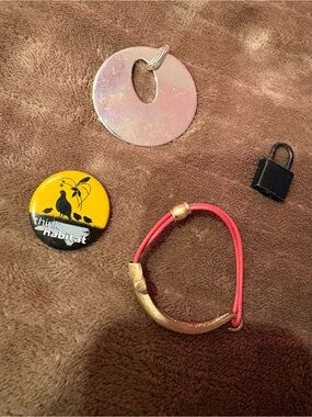 Gold Curved Tube Bracelet with Pink Cord